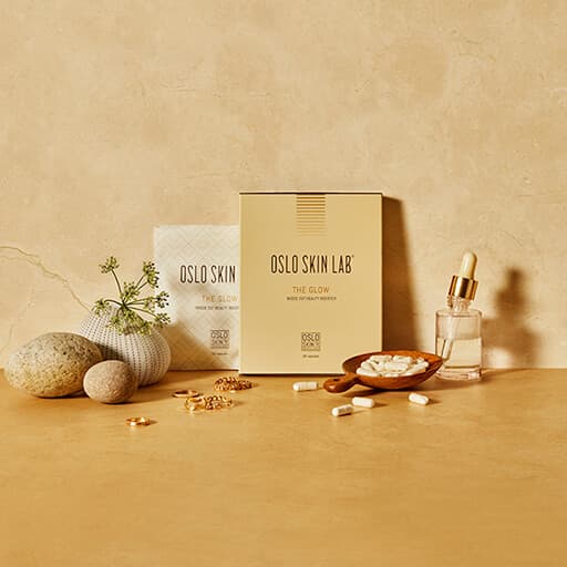 The Glow package against orange wall